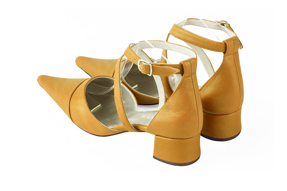 Mustard yellow women's open side shoes, with crossed straps. Pointed toe. Low flare heels. Rear view - Florence KOOIJMAN